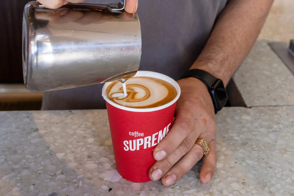 Latte art being poured at Ace's Coffee, Miami