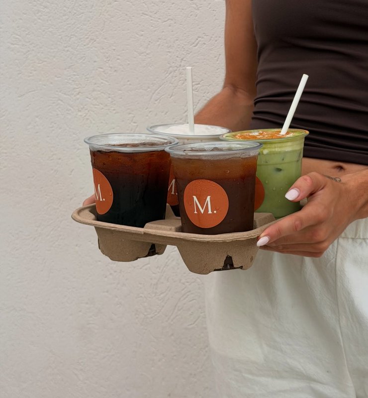 A takeaway tray of iced coffees and matcha from Mohr Cafe & Deli